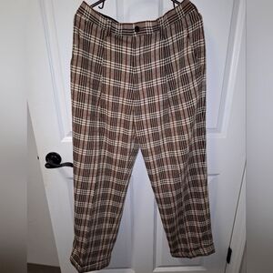 A pair of vintage Possi plaid pants in a waist size of 32. Retro, 70s business.